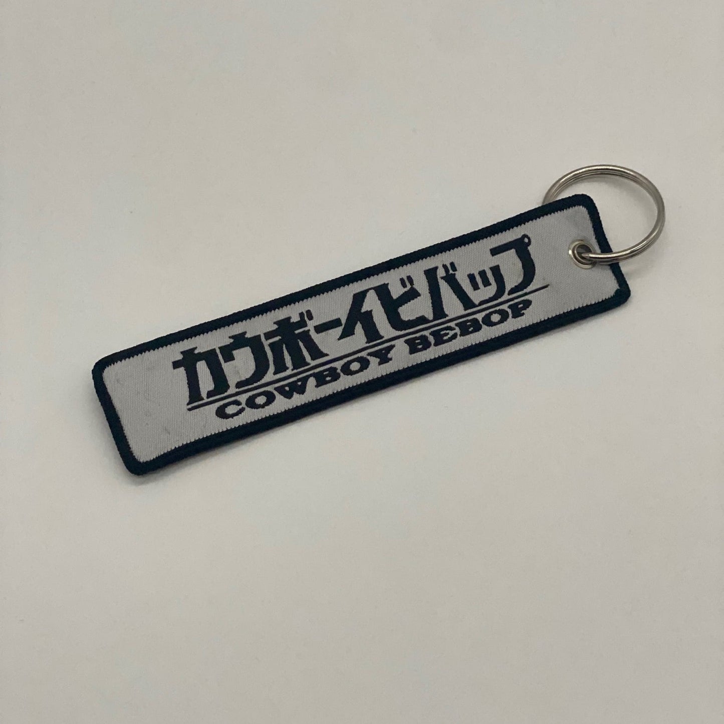 LIMITED COWBOY BEBOP SPIKE DUAL-SIDED EMBROIDERED KEY CHAIN/TAG